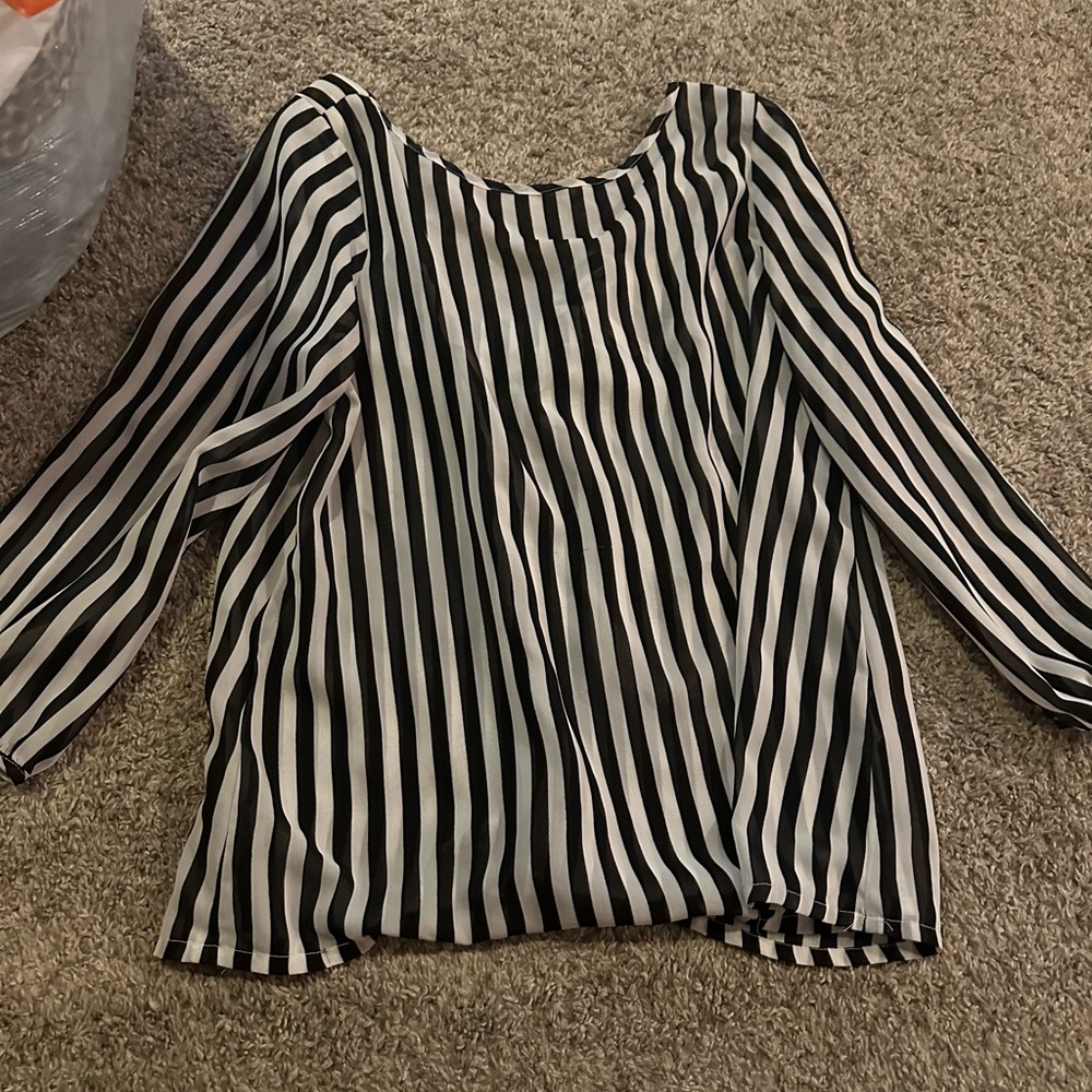 Black and white strip dress shirt. With open back and a bow